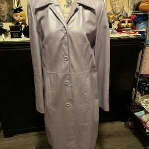 A Danier Genuine Leather Long Jacket in a nice Lilac Colour with a Flared Sleeve